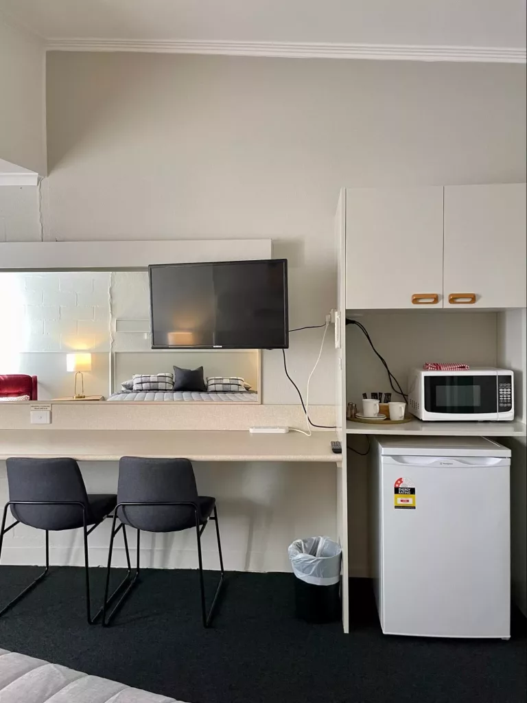 Superior king room with TV, fridge, microwave and seating